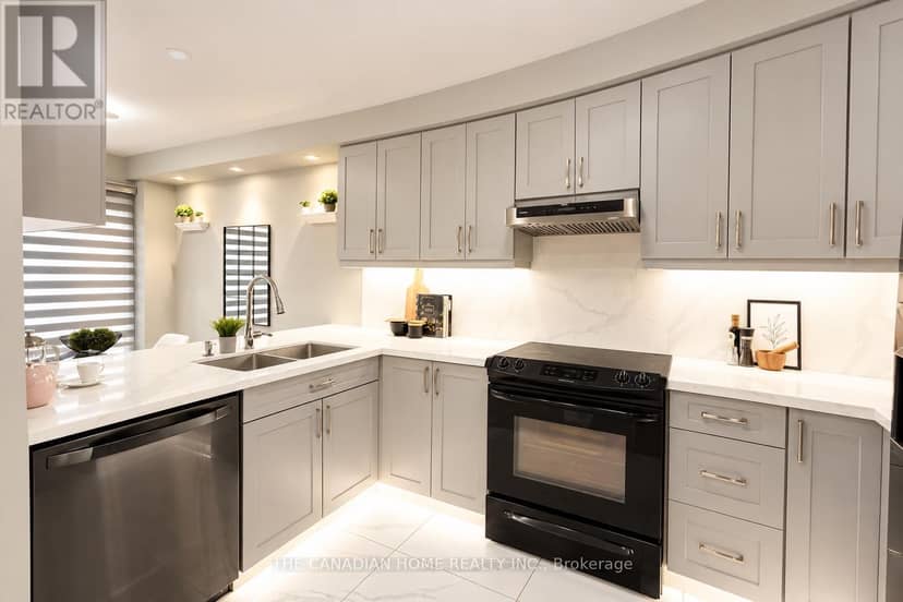 124 Tomabrook Crescent — photo 11 of 28