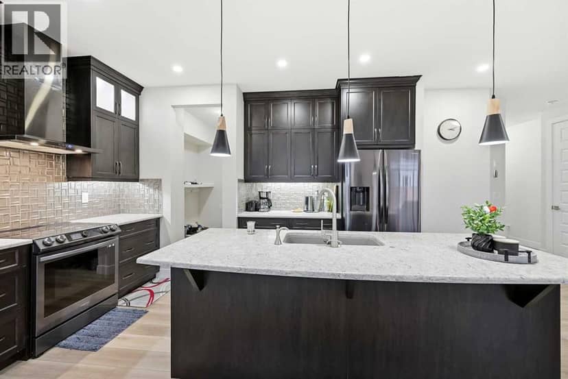 228 Carringham Road NW — photo 15 of 40