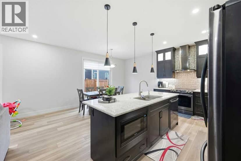 228 Carringham Road NW — photo 19 of 40