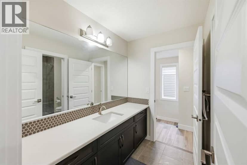 228 Carringham Road NW — photo 34 of 40