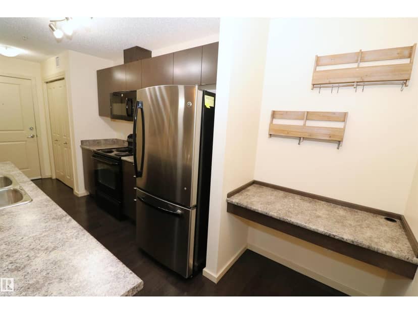 #202 340 Windermere Rd NW — photo 9 of 34