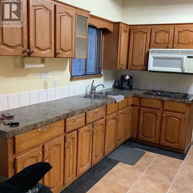 5731 GAIRDNER CRESCENT, Fort Nelson, photo 6