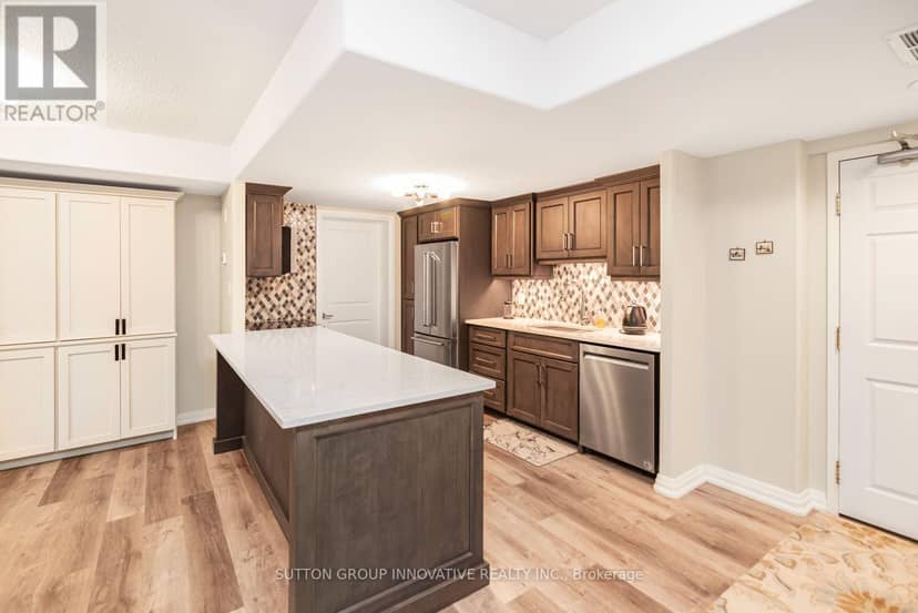 303 - 908 Mohawk Road E — photo 5 of 39