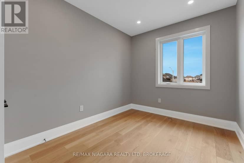 202 - 8900 Angie Drive — photo 22 of 26