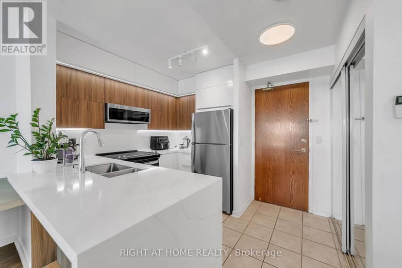 1202 - 11 Oneida Crescent — photo 1 of 25