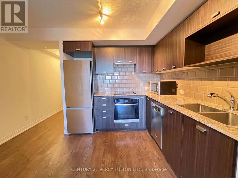 2405 - 255 Village Green Square — photo 8 of 23