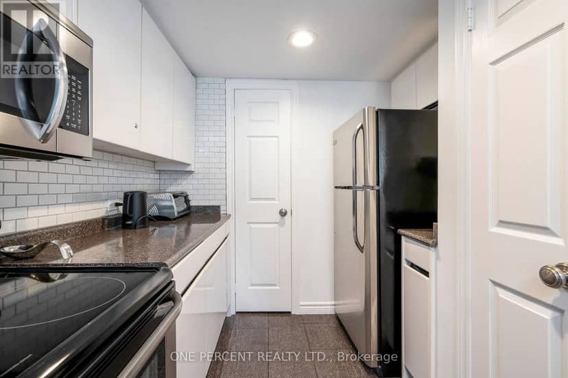 210 - 110 Fairway Court — photo 15 of 36