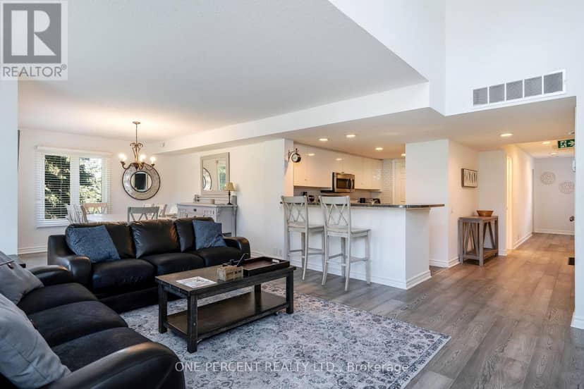 210 - 110 Fairway Court — photo 3 of 36