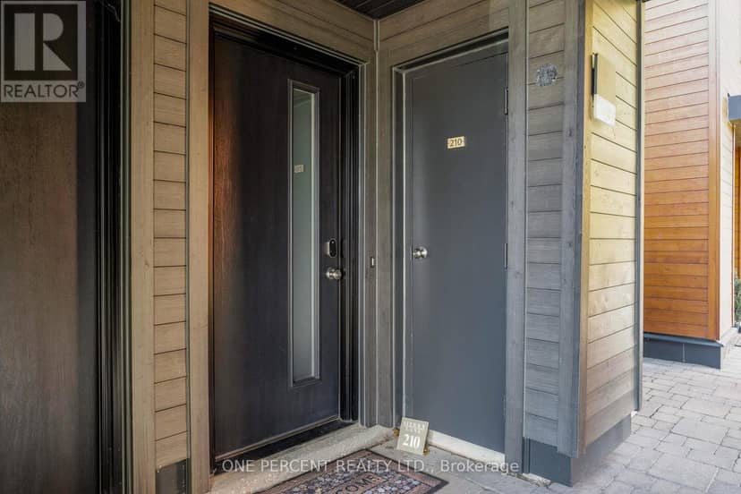 210 - 110 Fairway Court — photo 2 of 36