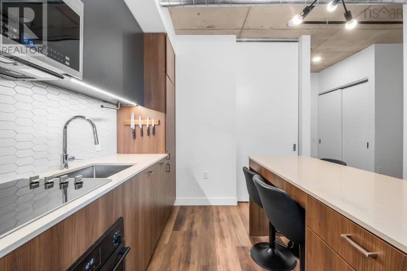 402 5511 Bilby Street — photo 5 of 40