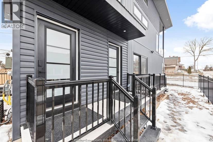 687 Assumption Street — photo 2 of 18