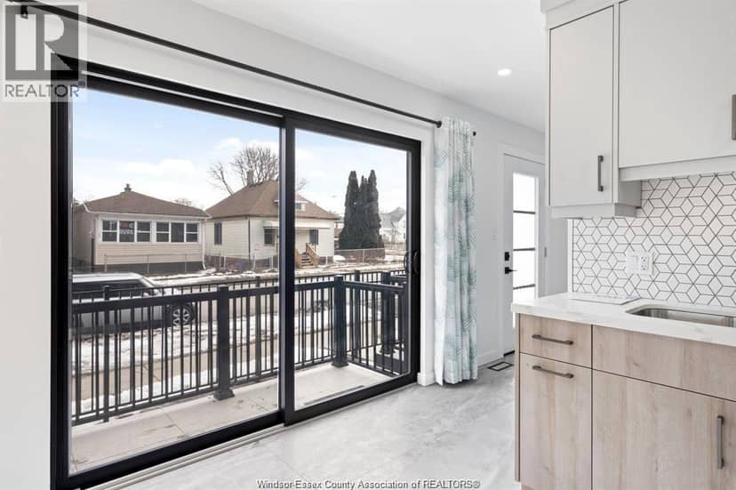 687 Assumption Street — photo 4 of 18