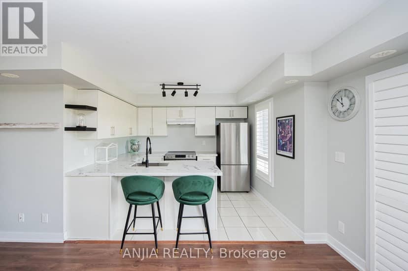 207 - 10 Dunsheath Way — photo 15 of 40