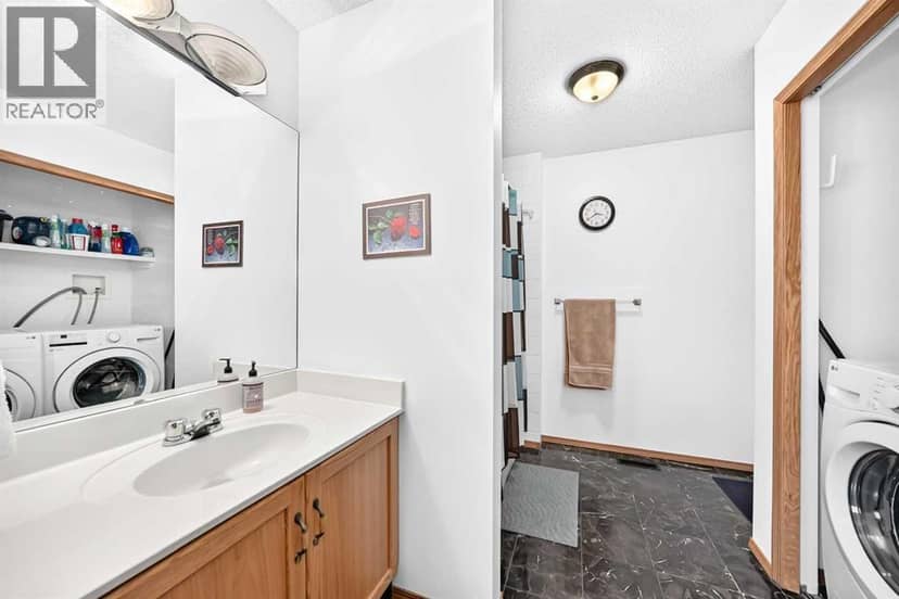 98 Country Hills Heights NW — photo 22 of 31