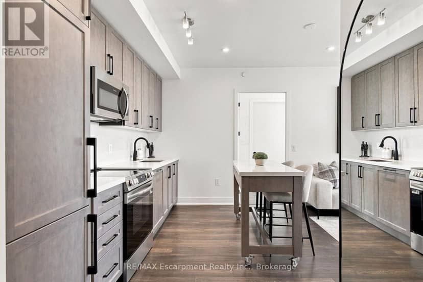 707 - 2450 Old Bronte Road — photo 7 of 37