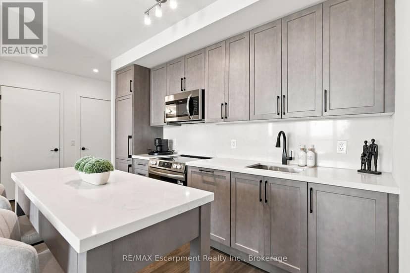 707 - 2450 Old Bronte Road — photo 8 of 37