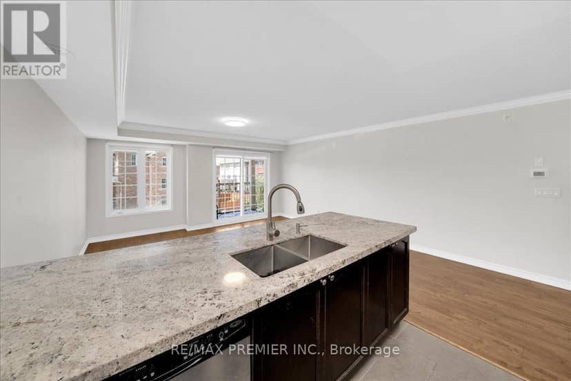 8 - 141 Isaac Devins Boulevard — photo 11 of 23