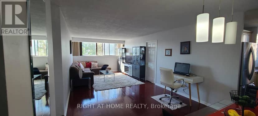 405 - 10 Tapscott Road — photo 6 of 24