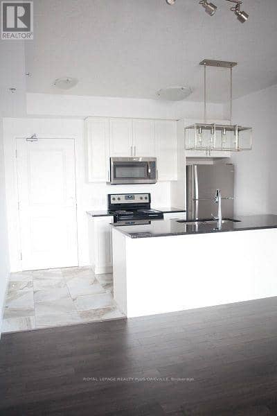 221 - 2490 Old Bronte Road — photo 3 of 20