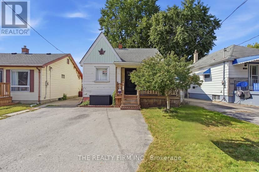 211 Highbury Avenue N — photo 1 of 40