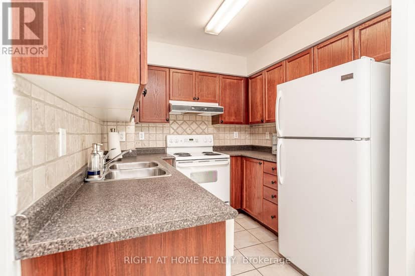 1010 - 23 Oneida Crescent — photo 17 of 40