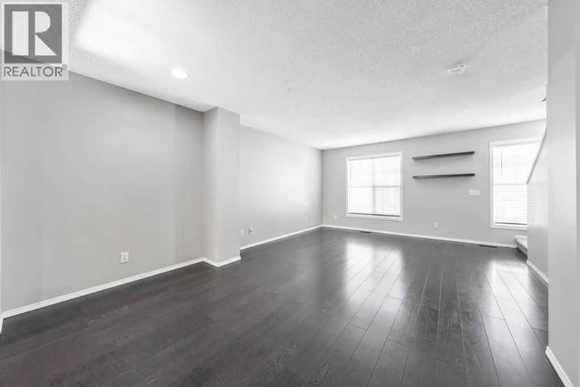 205 Toscana Gardens NW — photo 9 of 38