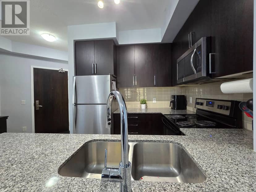 601 - 840 Queens Plate Drive — photo 10 of 18