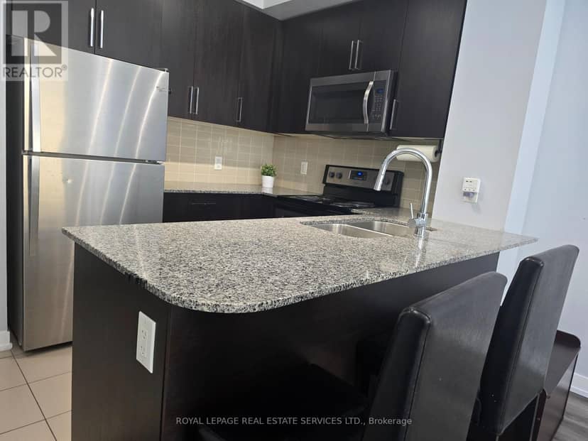601 - 840 Queens Plate Drive — photo 9 of 18