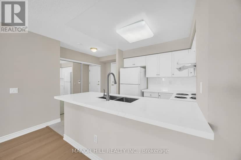 402 - 35 Kingsbridge Garden Circle — photo 11 of 35