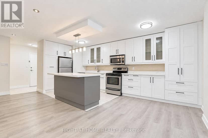109 - 3025 The Credit Woodlands Drive — photo 1 of 19