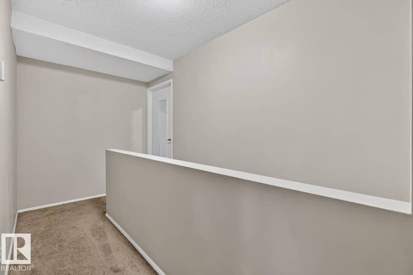 #106 237 Woodvale Rd NW — photo 13 of 25