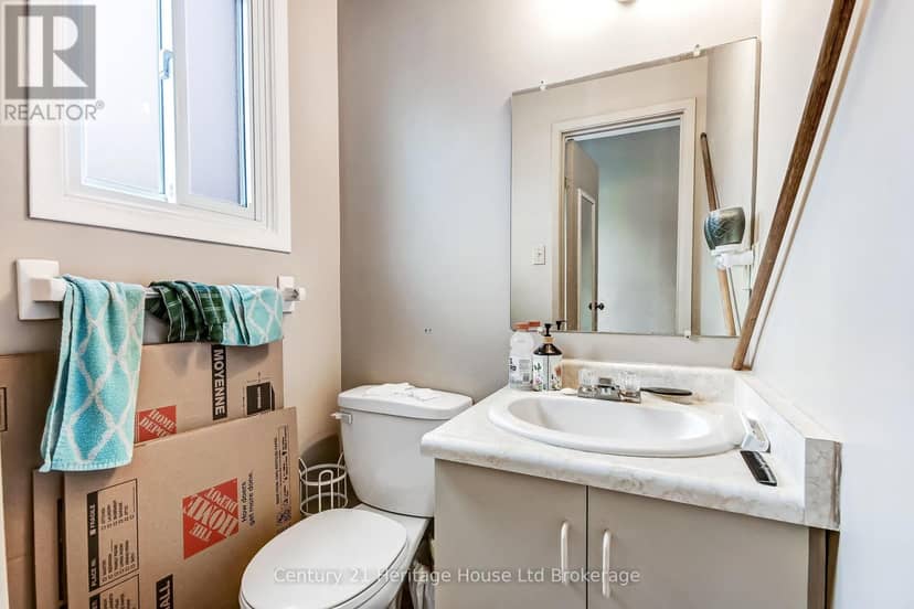37 - 455 Springbank Avenue N — photo 4 of 14
