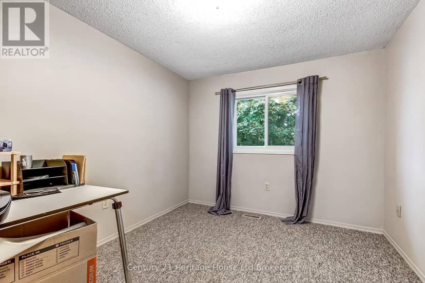 37 - 455 Springbank Avenue N — photo 7 of 14