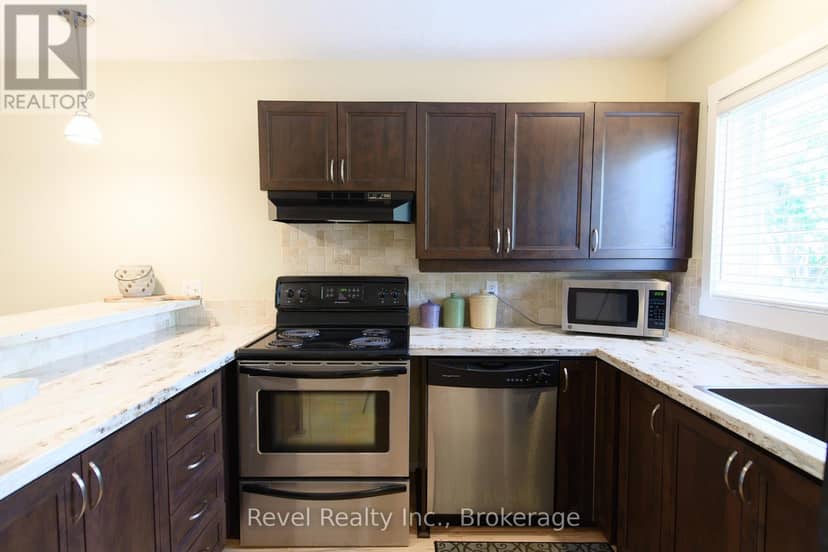 440 Oxbow Crescent W — photo 11 of 31
