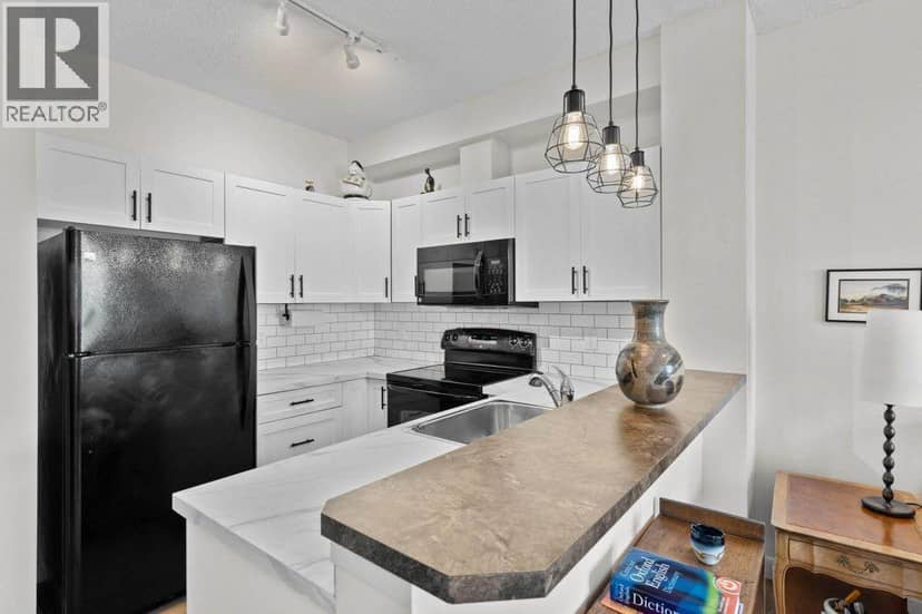 304, 201 Sunset Drive, Cochrane, photo 8