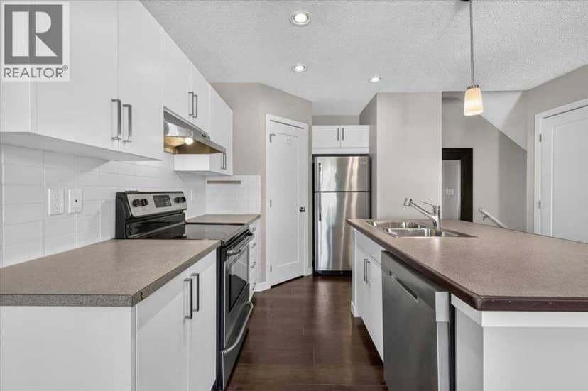 202, 881 Sage Valley Boulevard NW — photo 17 of 40