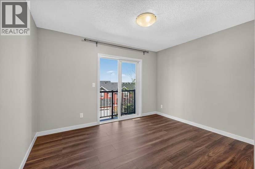 202, 881 Sage Valley Boulevard NW — photo 38 of 40