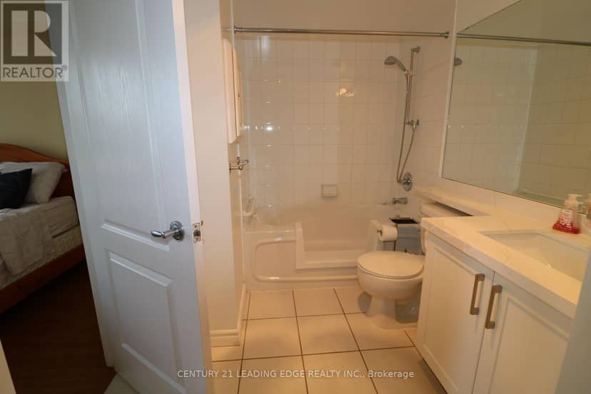 305 - 4640 Kimbermount Avenue — photo 16 of 20
