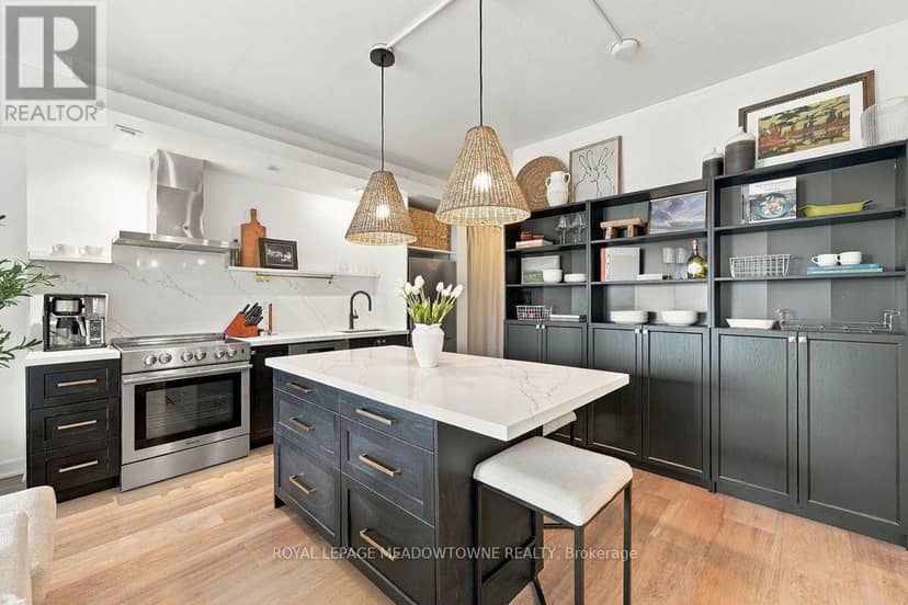 1321 - 165 Legion Road N — photo 4 of 22