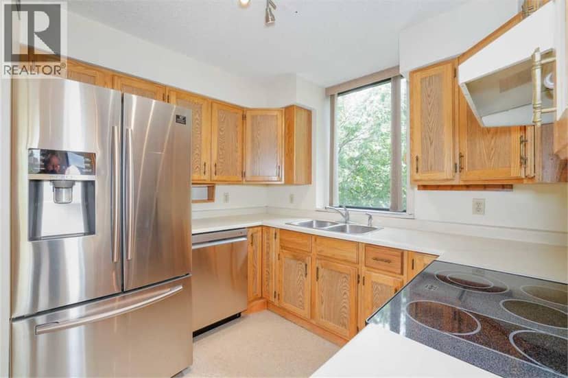 208, 80 Point Mckay Crescent NW — photo 12 of 18