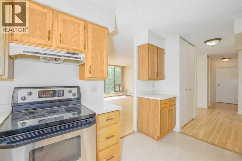 208, 80 Point Mckay Crescent NW — photo 13 of 18