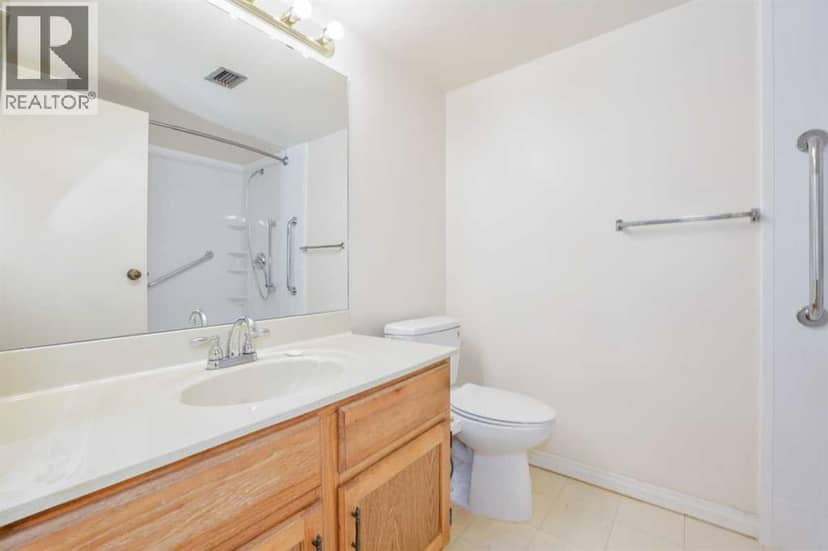 208, 80 Point Mckay Crescent NW — photo 15 of 18
