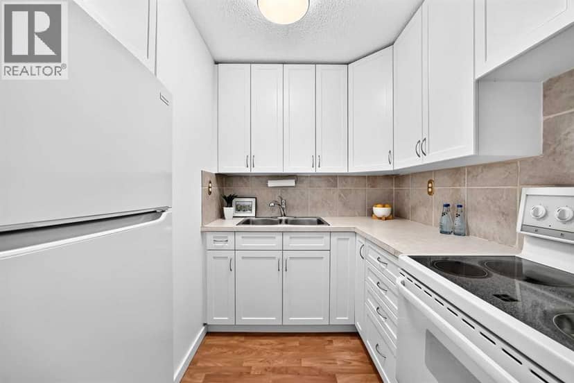 403, 11010 Bonaventure Drive SE — photo 12 of 31