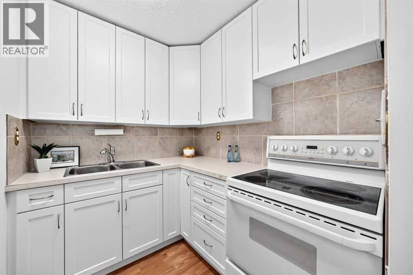 403, 11010 Bonaventure Drive SE — photo 13 of 31