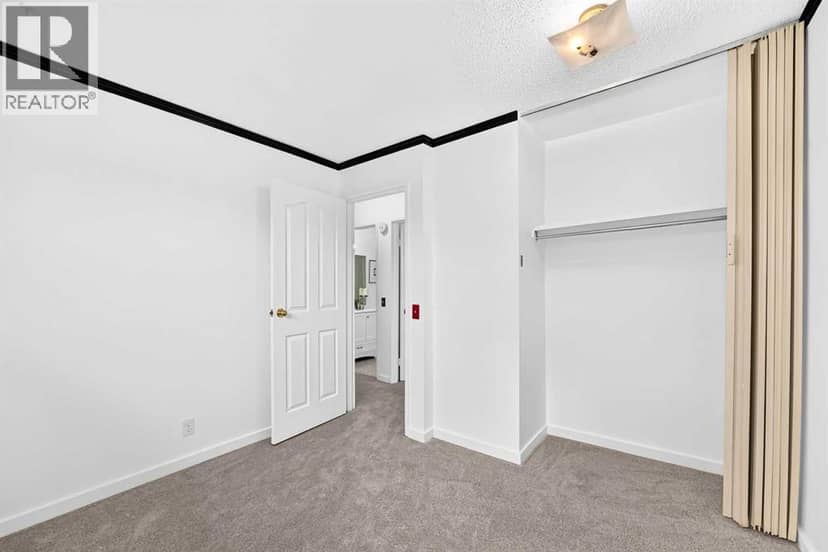 403, 11010 Bonaventure Drive SE — photo 16 of 31