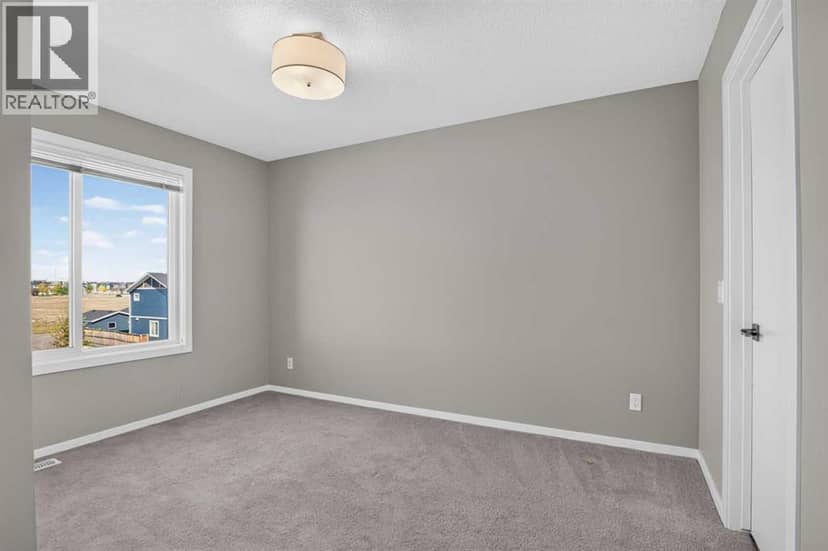 203, 315 Redstone Walk NE — photo 11 of 18