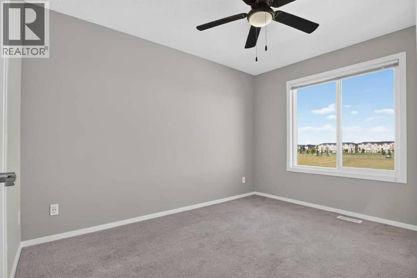 203, 315 Redstone Walk NE — photo 15 of 18