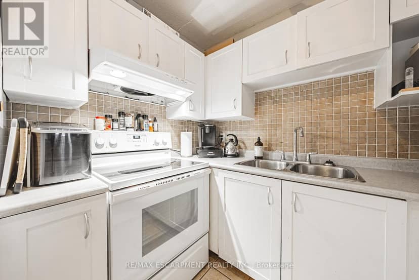 313 - 1451 Walkers Line — photo 10 of 31