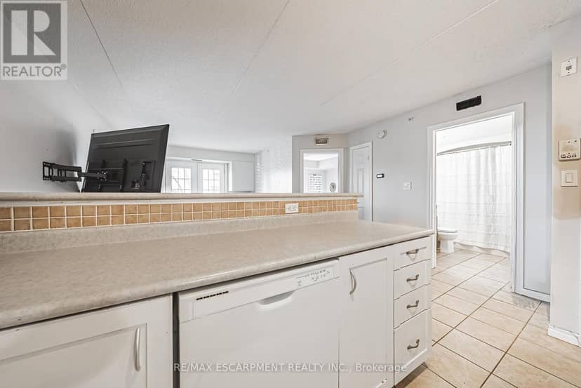 313 - 1451 Walkers Line — photo 11 of 31