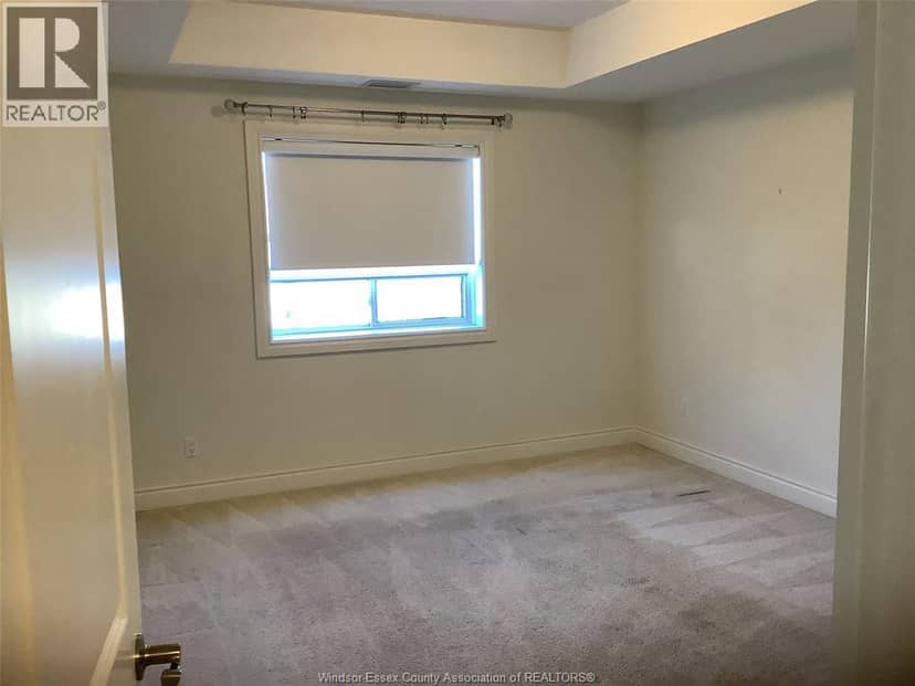 8475 WYANDOTTE STREET East Unit# 211 — photo 15 of 18